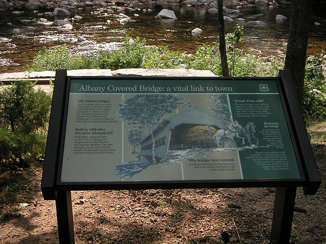 Sign at covered bridge